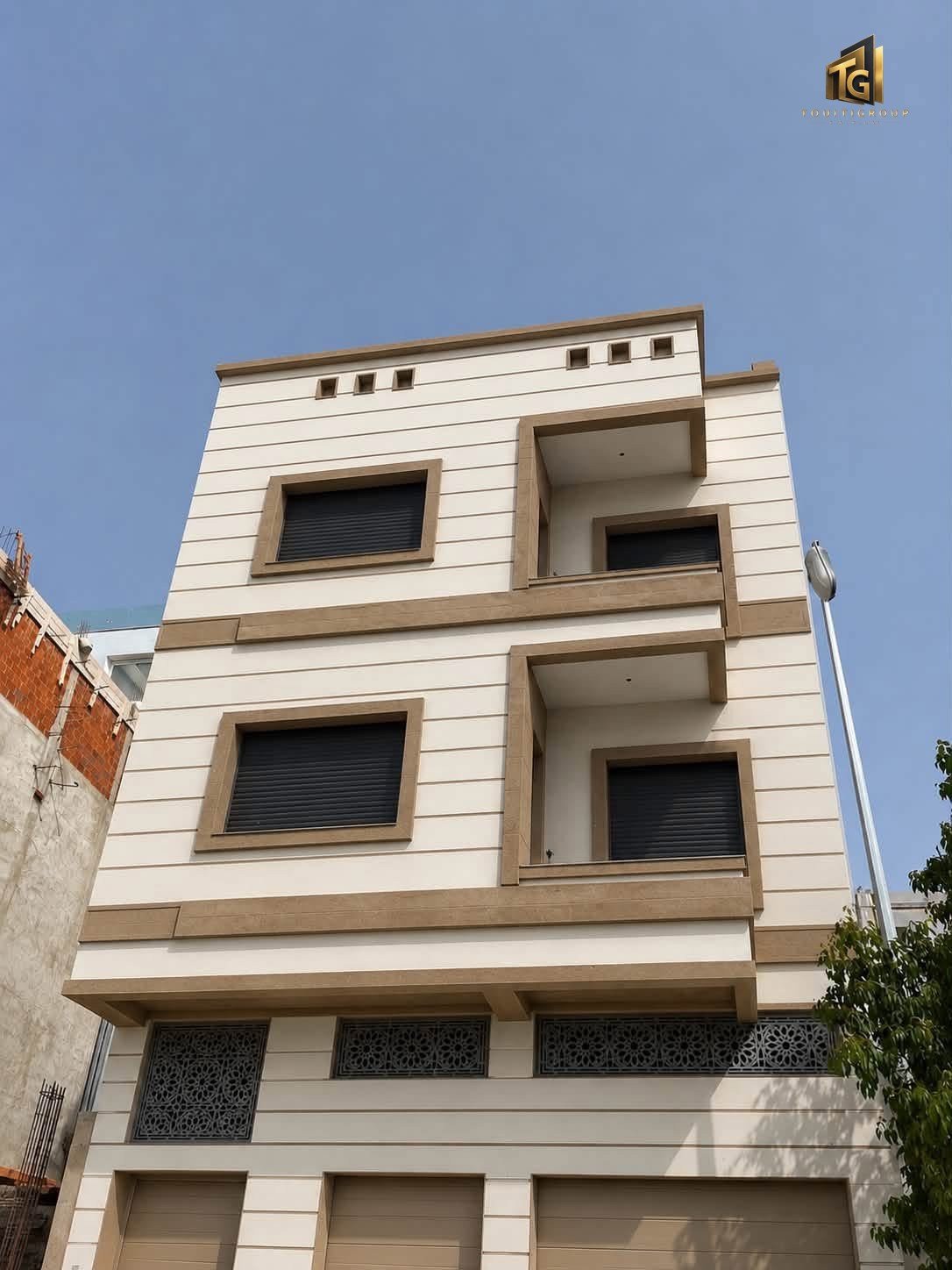 Immeuble après la finition de façade — TOUITIGROUP